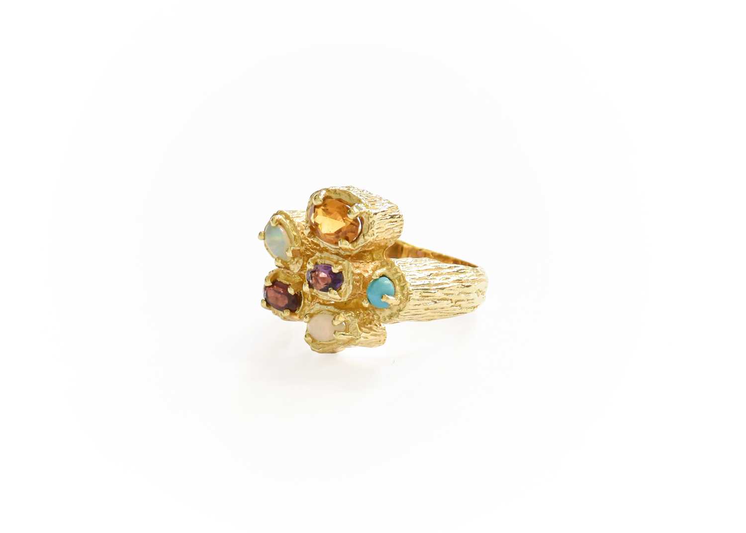 Lot 44 - A Multi-Gem Set Ring, the raised vari-shaped