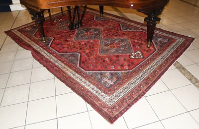 Lot 1151 - Kashgai Rug, the deep raspberry field of boteh...