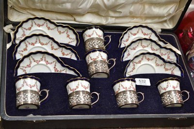 Lot 532 - Cased collection of six Crescent & Sons coffee cans and saucers in silver holders