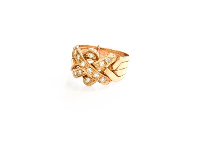 Lot 45 - A Diamond Puzzle Ring, the entwined bands set...