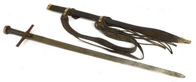 Lot 321 - A Sudanese Kaskara, the 88cm double edge steel...