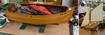 Lot 387 - Model clinker built small sailing boat PN90...