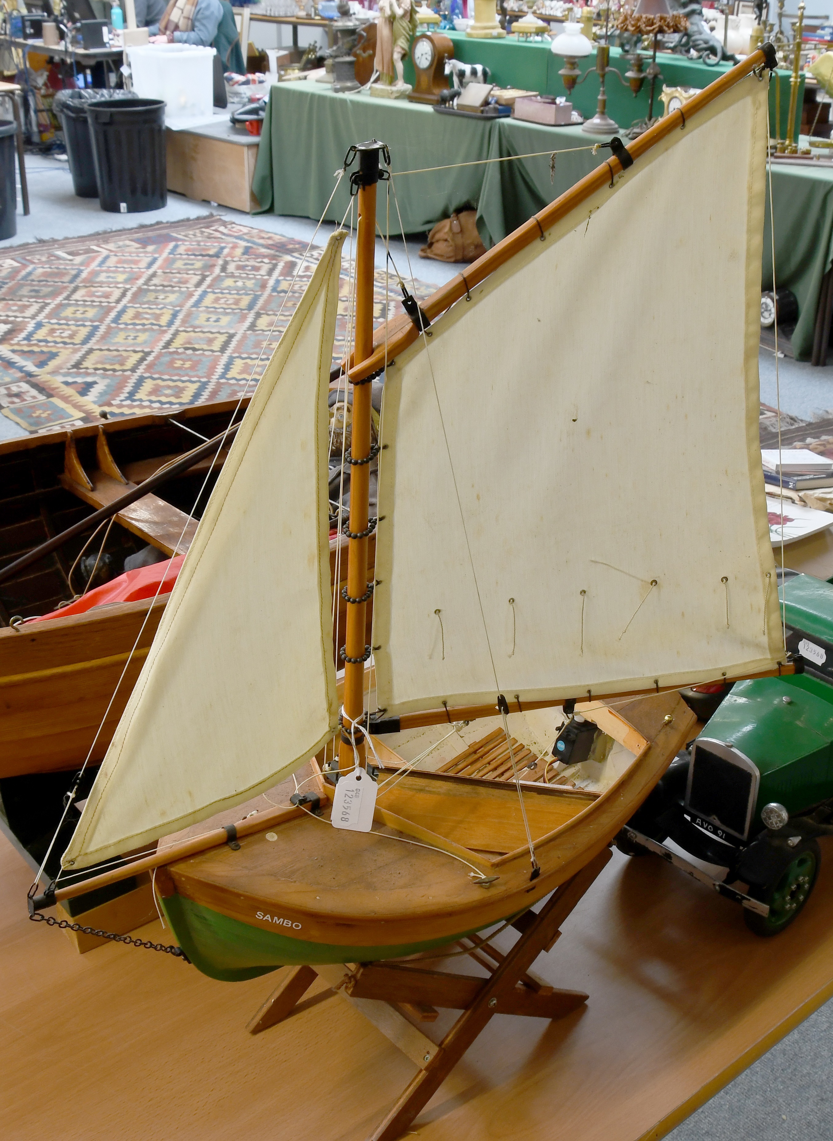Lot 387 - Model clinker built small sailing boat PN90