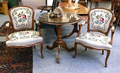 Lot 1350 - A Pair of French Carved Walnut Fauteuil, with...