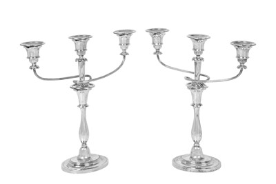 Lot 2115 - A Pair of George VI Silver Three-Light Candelabra