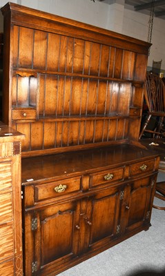 Lot 1298 - A 20th Century Oak Dresser and Rack, 139cm by...