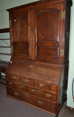 Lot 692 - A 19th century oak bureau bookcase