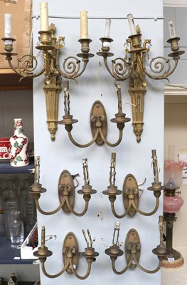 Lot 1202 - A Pair of Gilt Metal Eight Light Wall Sconces,...