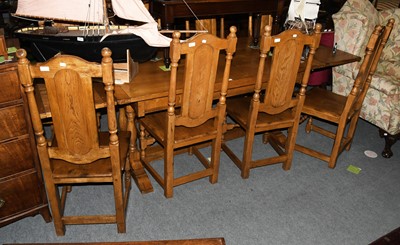 Lot 1290 - A Modern Oak Draw Leaf Dining Table, on...