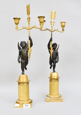 Lot 334 - A Pair of Regency Gilt Metal and Patinated...