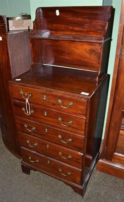 Lot 699 - A George III mahogany narrow chest of drawers with raised upstand, 51cm wide