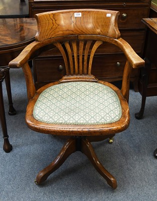 Lot 1258 - An Oak Swivel Office Chair