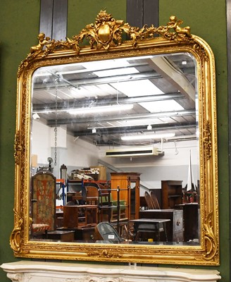 Lot 1220 - A Reproduction Gilt Framed Mirror, surmounted...