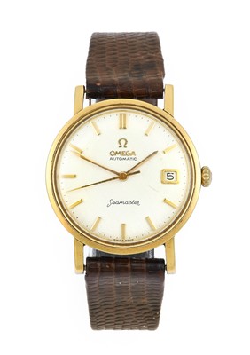 Lot 2178 - Omega: An 18 Carat Gold Automatic Calendar...