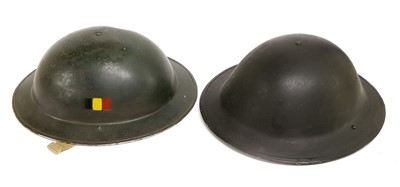 Lot 231 - Two British Brodie Helmets, one with leather...