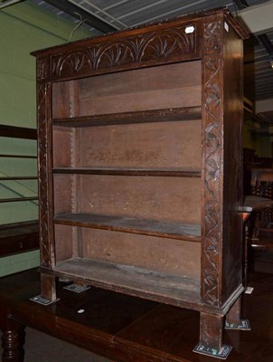 Lot 710 - Early 20th century carved oak open bookcase