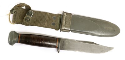 Lot 325 - A US Navy MK.I Fighting Knife, the 13cm clip...