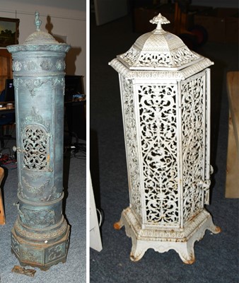 Lot 1331 - A Pierced and Painted Cast Metal Stove Casing,...