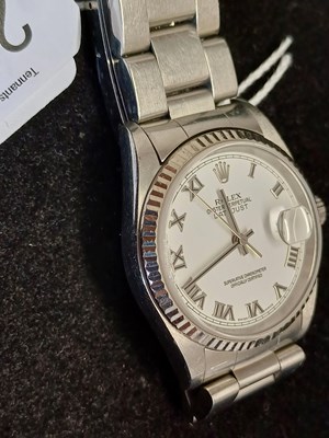 Lot 2196 - Rolex: A Stainless Steel Automatic Calendar...