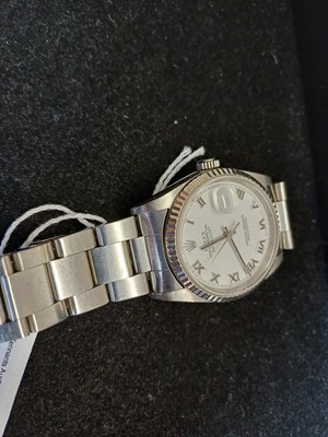 Lot 2196 - Rolex: A Stainless Steel Automatic Calendar...