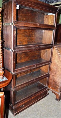 Lot 724 - A five section Globe Wernicke bookcase in stained oak