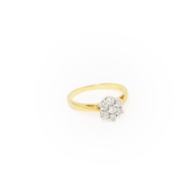 Lot 247 - An 18 Carat Gold Diamond Cluster Ring, set...