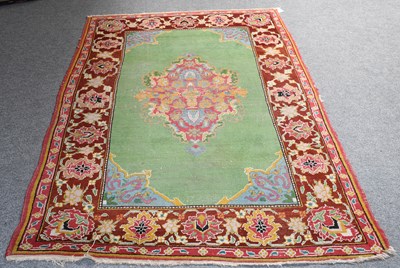 Lot 1231 - Amritsar Rug, the field centred by a floral...