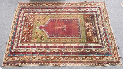Lot 1321 - Anatolian Prayer Rug, the Mihrab surrounded by...