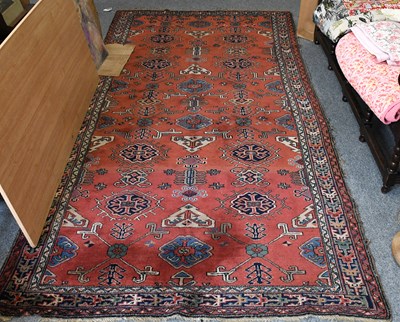 Lot 354 - Turkish Carpet, the soft terracotta field of...