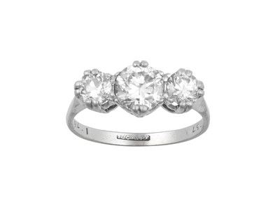 Lot 2270 - A Diamond Three Stone Ring the graduated round...