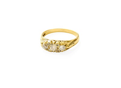 Lot 203 - An 18 Carat Gold Diamond Three Stone Ring, the...