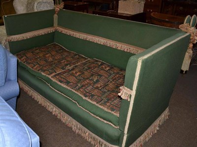 Lot 750 - A green upholstered Parker Knoll style drop end sofa