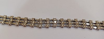 Lot 2262 - A Diamond Bracelet of brick link form, three...