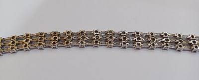Lot 2262 - A Diamond Bracelet of brick link form, three...