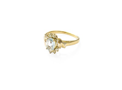 Lot 224 - An Aquamarine and Diamond Ring, the oval cut...