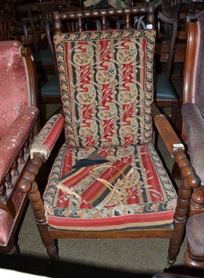 Lot 768 - A Victorian oak framed armchair with bobbin turned details