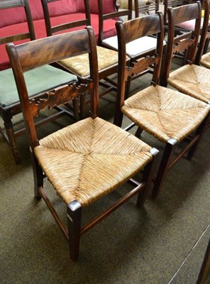 Lot 777 - Six rush seated mahogany country chairs