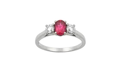 Lot 2323 - A Platinum Ruby and Diamond Three Stone Ring...