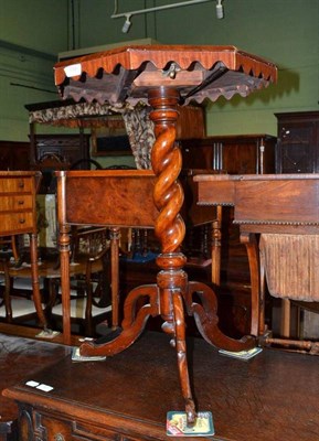 Lot 788 - A Victorian walnut parquetry top table with barley twist column and fret cut feet