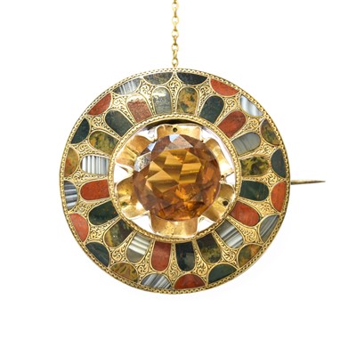 Lot 200 - A Citrine and Agate Brooch, the round cut...