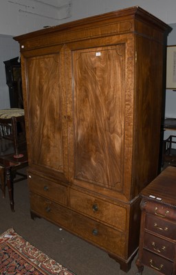 Lot 1290 - A Regency Mahogany Linen Press, with ebony...