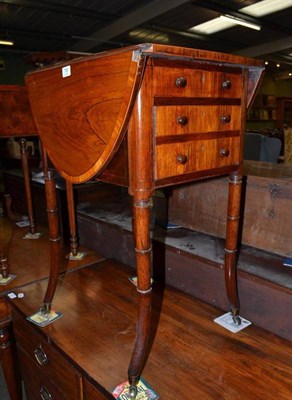 Lot 796 - A walnut games table fitted with drawers on splayed bamboo form feet, width 65cm