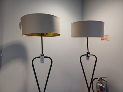 Lot 393 - Two 1950s Floor Lamps, twist frames on...