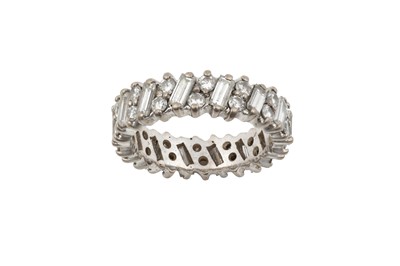 Lot 2278 - A Diamond Eternity Ring pairs of round...