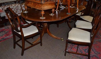 Lot 804 - Reproduction pedestal dining table and eight chairs