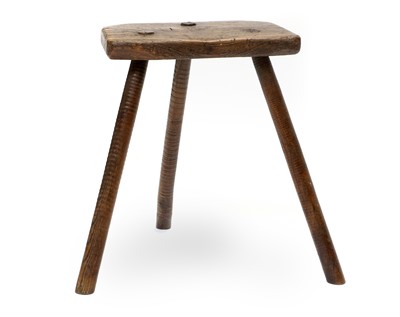 Lot 807 - A Provincial Oak Stool, early 19th century, of...