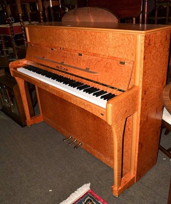 Lot 808 - A modern Seiler overstrung piano in a faux maple veneered case