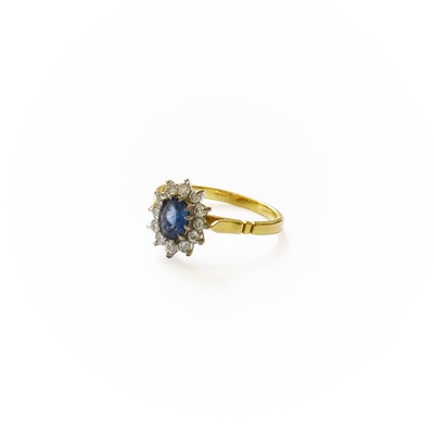 Lot 282 - An 18 Carat Gold Sapphire and Diamond Cluster...