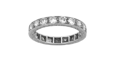 Lot 2276 - A Diamond Eternity Ring nineteen round...