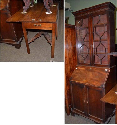 Lot 811 - A mahogany bureau bookcase and a mahogany Pembroke table